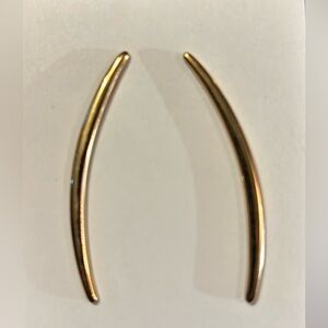 Vintage Avon long post earrings with “Avon”printed on backings. Approx. 2” long